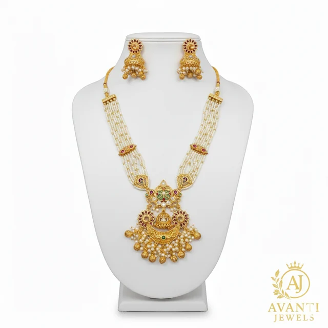 Gold-tone jewelry set with white bead strands from Avanti Jewels